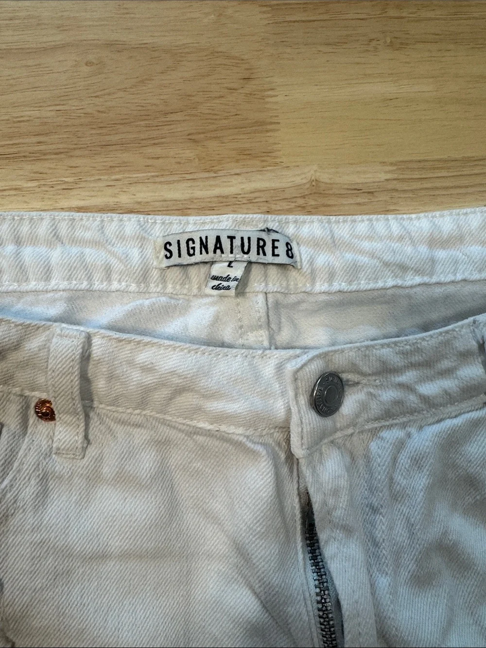 Signature8 Off-White Distressed Denim Cutoff Shorts